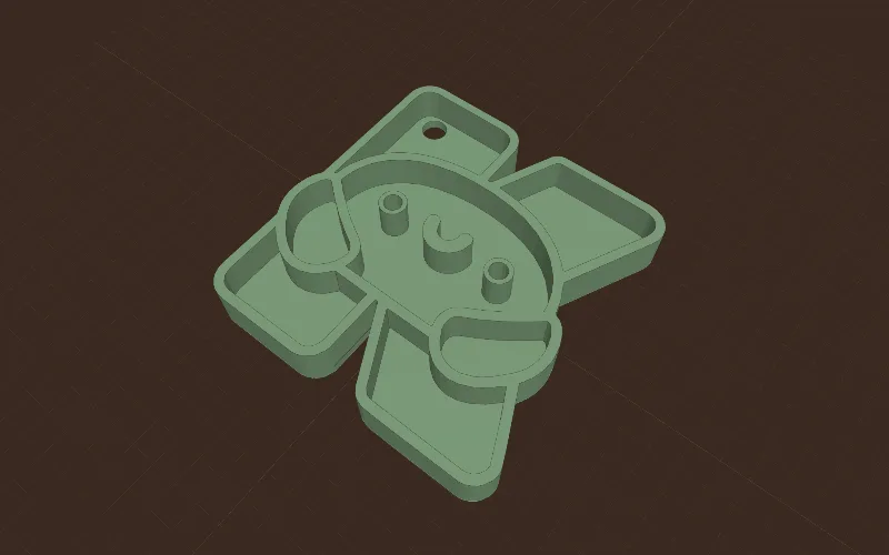 Le logo Kutterly en porte-clé, avec son trou d'anneau dans le coin du K.