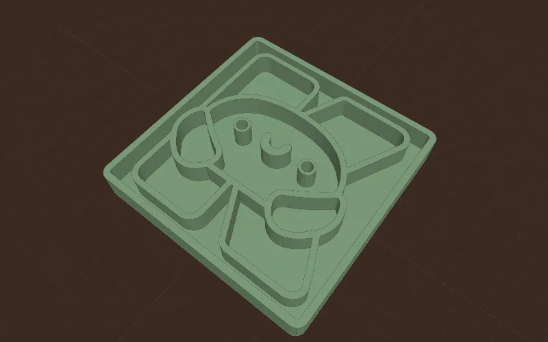 Le logo Kutterly en tampon : une plaque avec le dessin en relief.